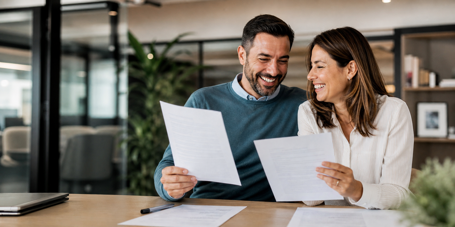 Happy Couple Celebrating Mortgage PreApproval Approval