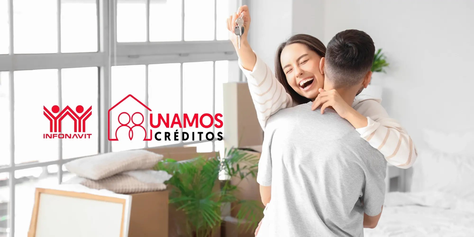 Unamos Créditos Infoanvit - Pareja joven está celebrando la adquisición de su nueva vivienda